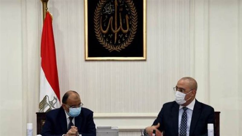 وزيرا الإسكان والتنمية