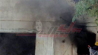 إخماد حريق بثلاجة حفظ 