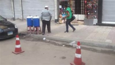 تفاصيل فيديو لشخص يمارس البلطجة للحصول على مبالغ مالية مقابل ركن السيارات