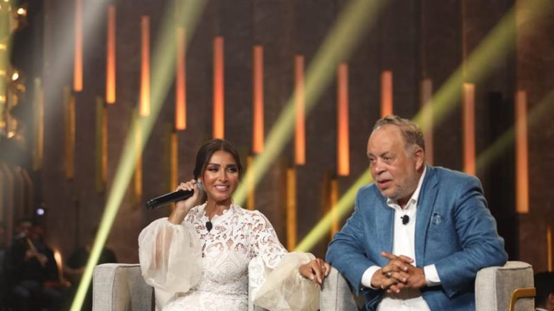 أشرف زكي وروجينا