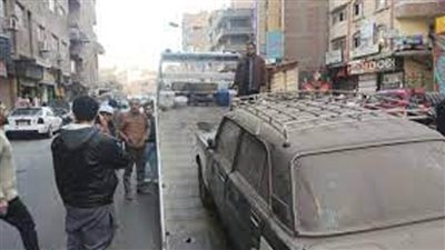 محافظة الجيزة تواصل حملات رفع السيارات المتهالكة والمتروكة بالشوارع