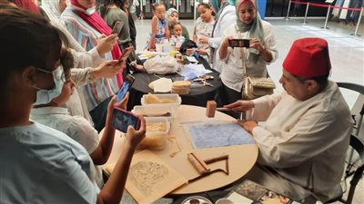 ورشة للأطفال عن صناعة ورق البردي بمتحف الحضارة