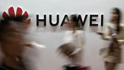 الصين تتوعّد باتّخاذ "الإجراءات اللازمة" لحماية هواوي