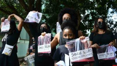 المئات يطالبون بالعدالة لكونغولي ضرب حتى الموت في البرازيل