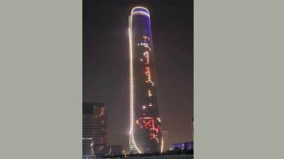 بالفيديو.. البرج الأيقوني يضئ بعبارة" وفرحت مصر- 6 أكتوبر"
